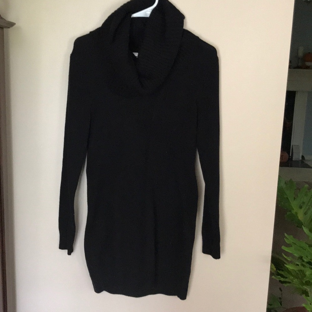Turtle neck black form fitted dress